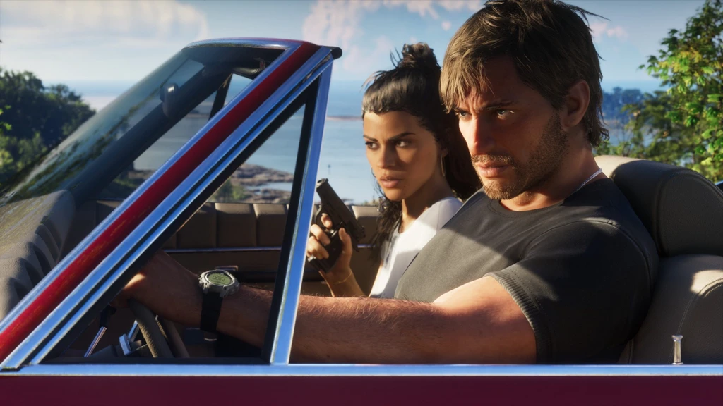 Ett par i en röd cabriolet vid kusten i Grand Theft Auto VI: en allvarlig man vid ratten och en kvinna bakom honom som håller en pistol.