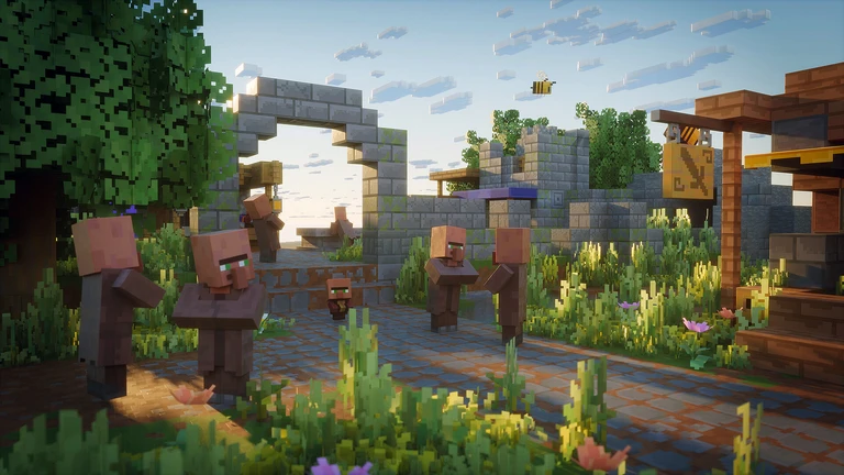 Flera byar-invånare står på en stenlagd plats bland blommor och höga gräs vid en raserad stenmur i Minecraft, med en bi som svävar mot en blå himmel.