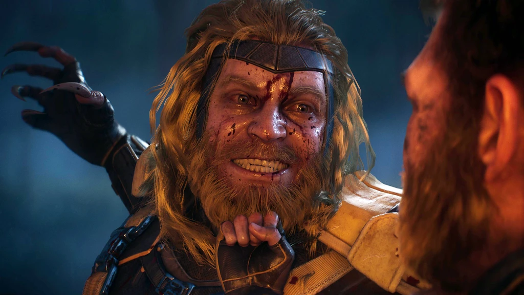 Blodstänkt, flinande man med långt rödblont hår, skägg och pannband sträcker fram en klolik handske mot en skäggig man i förgrunden, i en mörk scen ur Marvel's Wolverine.