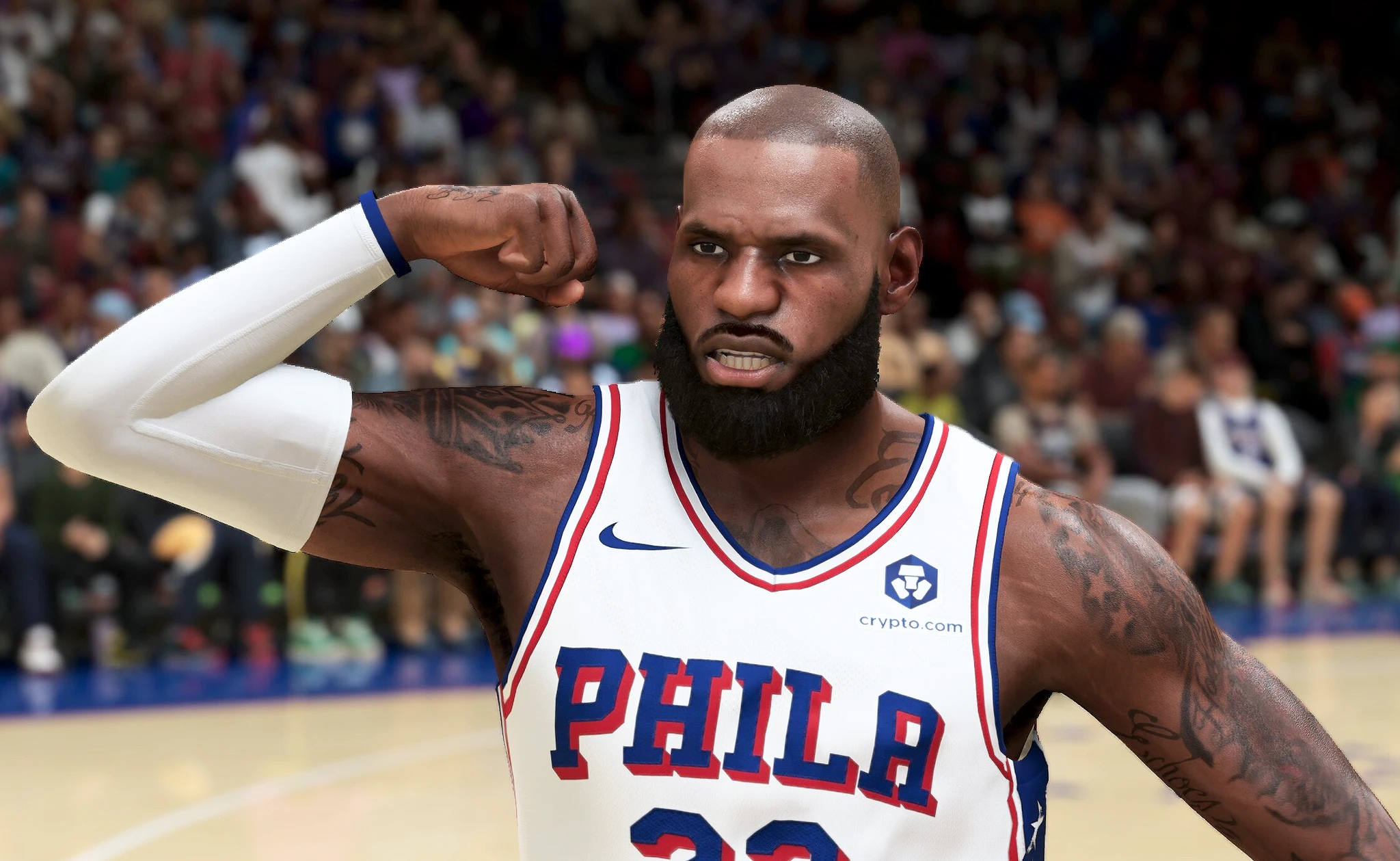 Spelarkaraktär i Philadelphia 76ers-tröja spänner överarmsmuskeln och tittar stint in i kameran framför en suddig publik i NBA 2K27.