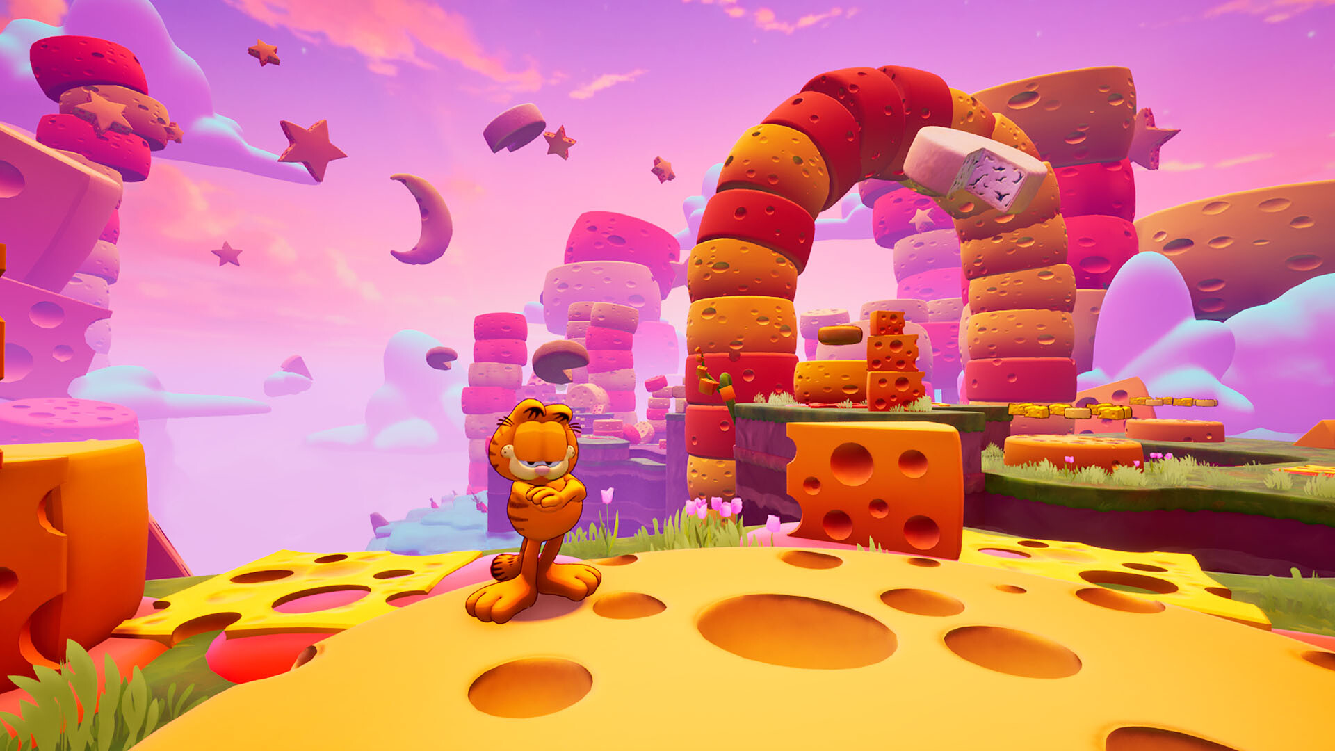 Garfield står med korsade armar på en ostliknande kulle i Garfield: Escape from Monday, omgiven av en färgglad drömvärld med svävande stjärnar, en måne och en stor valvbåge av bakverk.