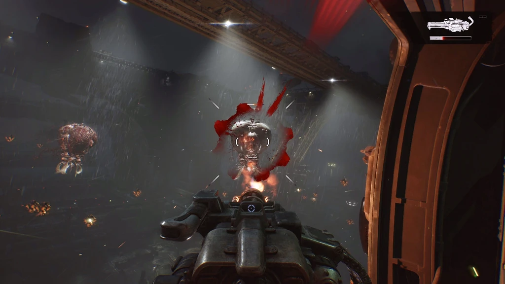 Förstapersonsvy från Gears of War: E-Day där en monterad kulspruta eldar mot en flygande fiende i en mörk, rökfylld hall, med röda blodstänk runt målet.