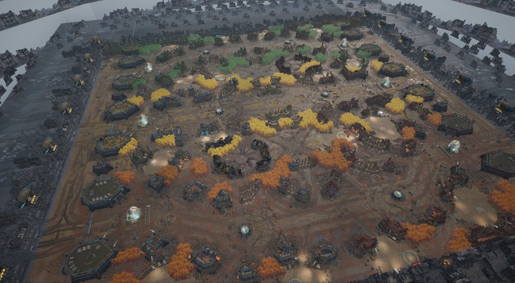 Överblick över en stor lerig slagfältskarta i March of Giants, med utspridda befästningar, byggnader och fläckar av gul och orange vegetation, omgiven av mörk stadsbebyggelse.
