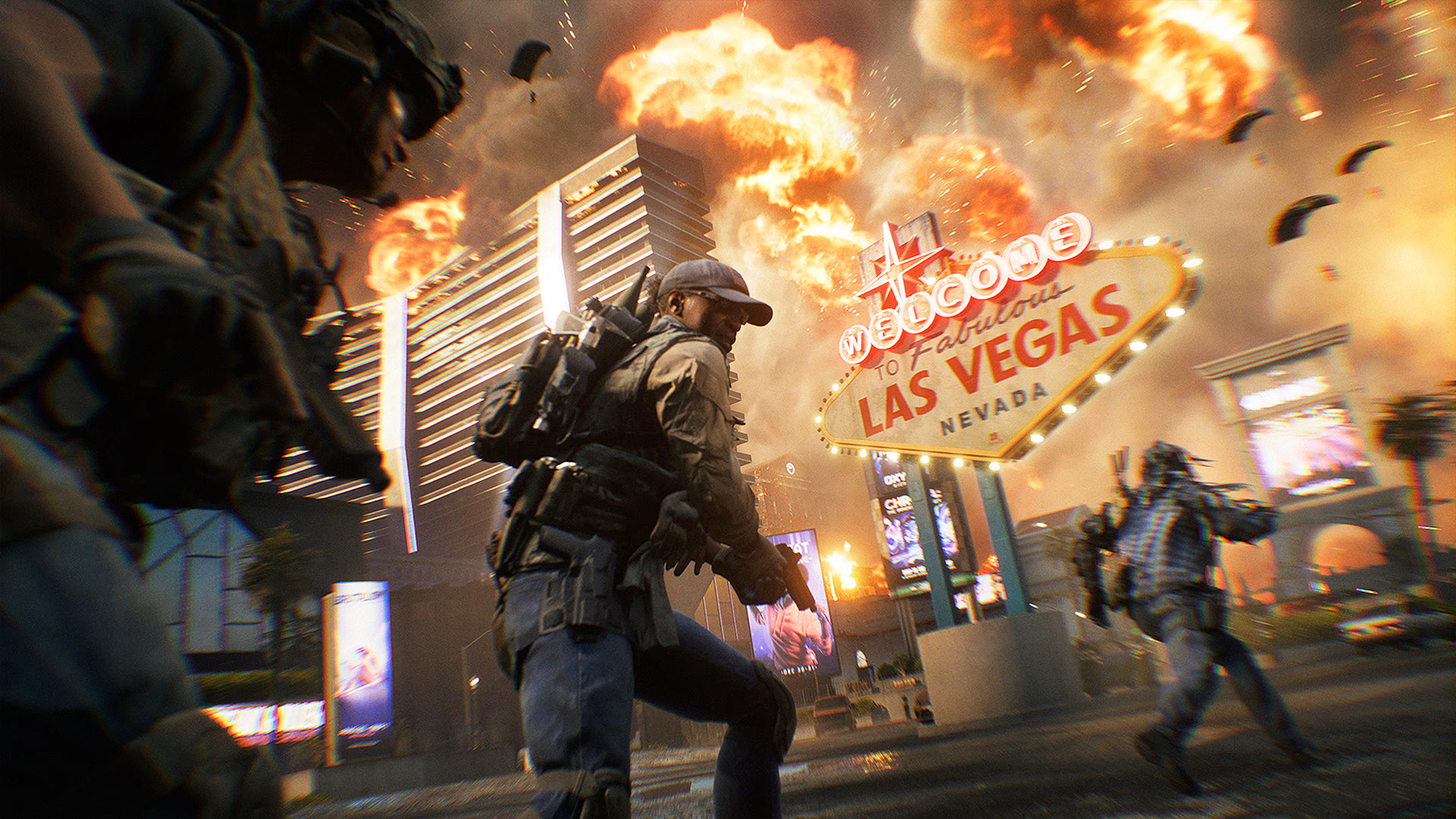 Soldater i stridsutrustning springer förbi den berömda Welcome to Fabulous Las Vegas-skylten medan explosioner lyser upp hotellen bakom i Battlefield 6.