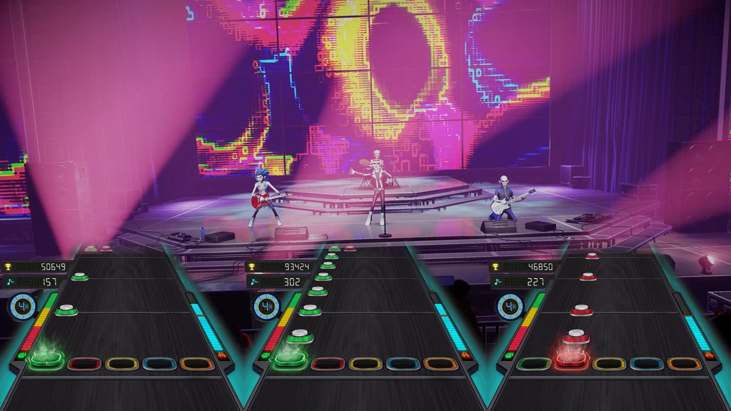 Tre notspår med poäng i förgrunden över en scen i Stage Tour, där tre animerade bandmedlemmar spelar gitarr, sång och trummor framför en neonfärgad bildskärmsvägg.